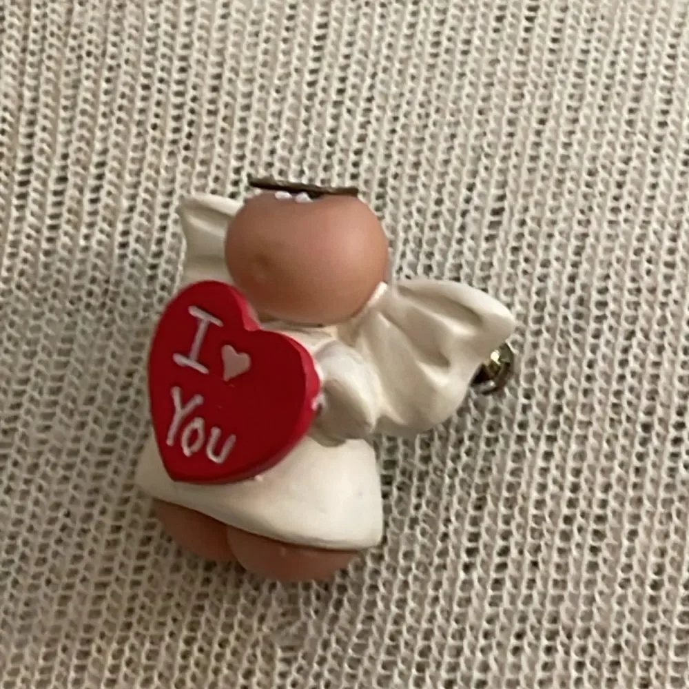 Kirk’s Angel Cheeks Angel Holding a Red Heart “ I ❤️ You”